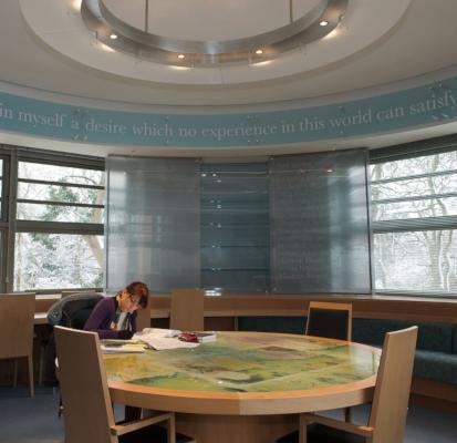 Female student studying in the McClay Library