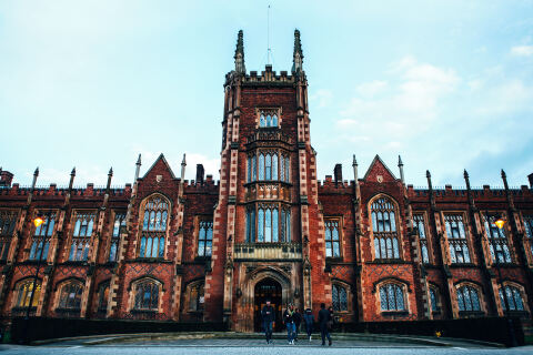 Students walking through the main entrance of the Lanyon Building