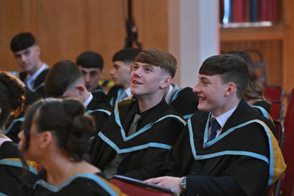 05. Laughter and pride fill the Whitla Hall as R-City graduates share this special milestone with one another.