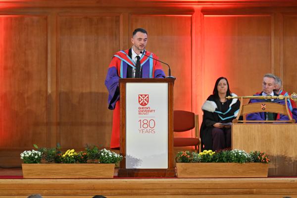 12. Dr Wayne Travers addresses the audience, acknowledging the commitment and growth of the R-City participants throughout the programme.