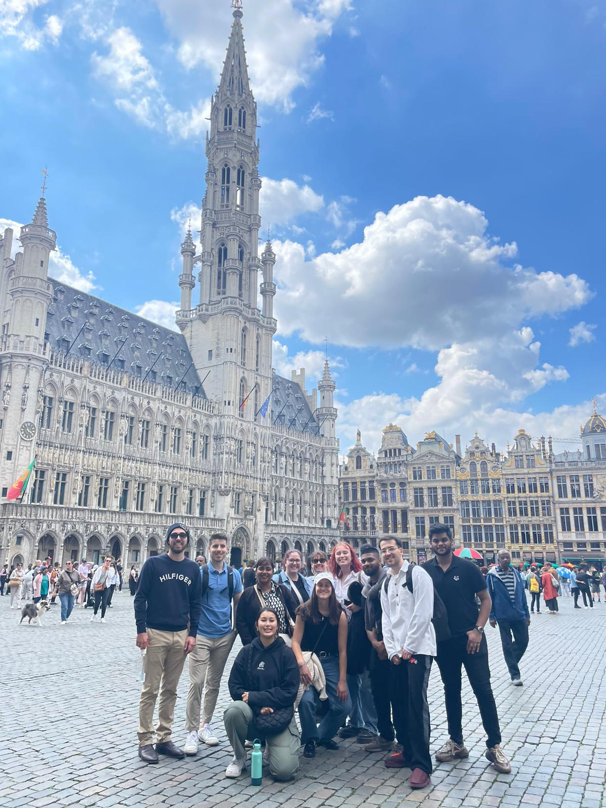 Brussels landmark with group of students