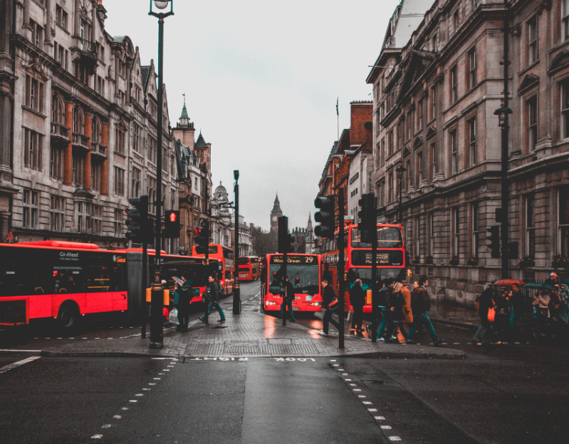 Busy street in London with buses and people