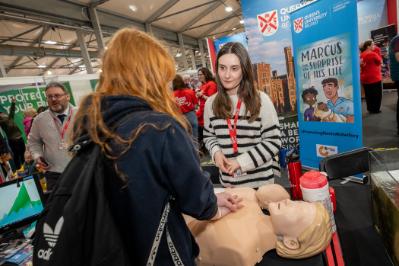 Staff from the School of Nursing and Midwifery teach attendees PCR skills