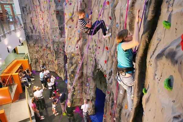 members of the Queen's University Belfast Mountaineering club using the climbing wall in the PEC