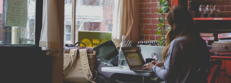 woman studying in coffee shop