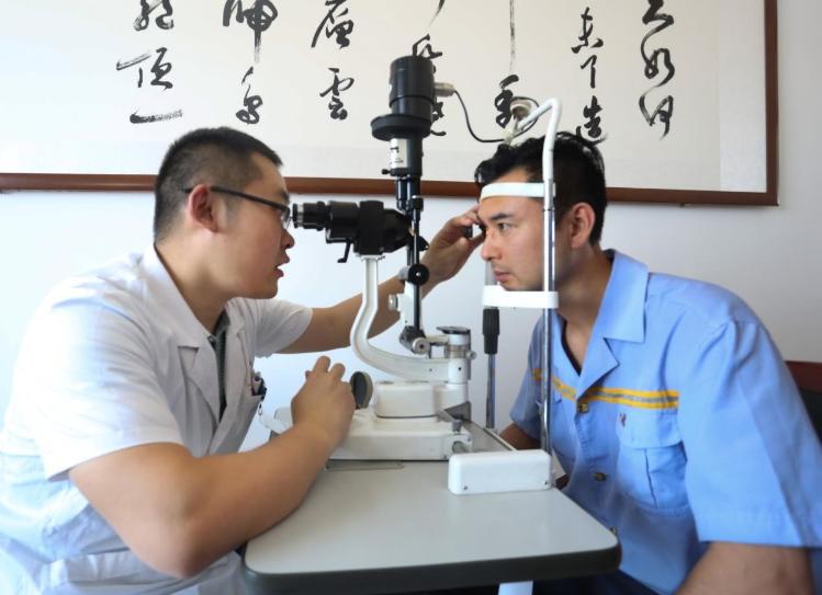 Chinese Doctor Testing a patient 