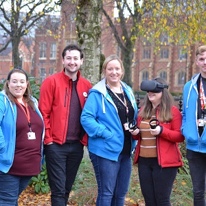 Five students standing in front of Queen's