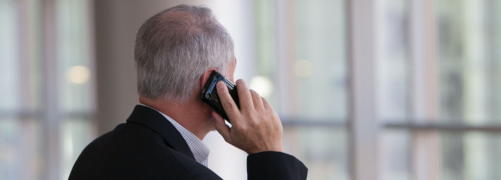 Man with a phone to his ear