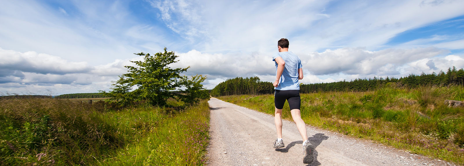 Man running on a country road