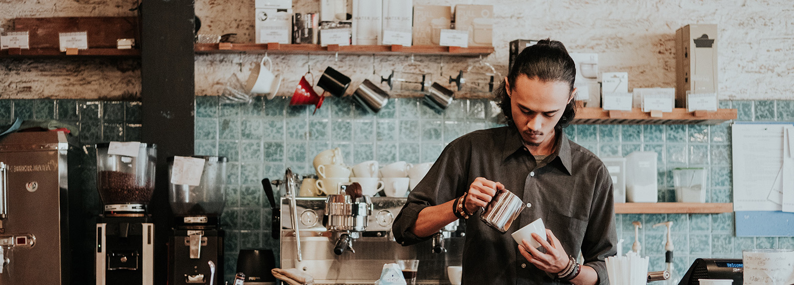 Barista making coffee