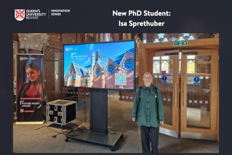 Photo of Isa Sprethuber, new PhD student, in the Graduate School at Queen's (a 19th Century building with vaulted ceiling and modern equipment)