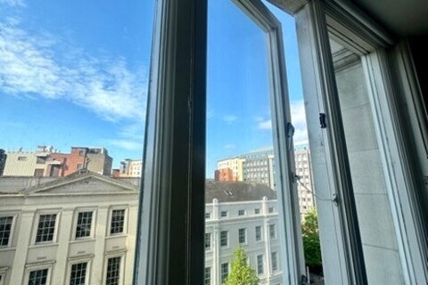 Window showing a sunny day outside
