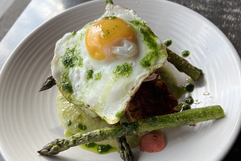 Eggs and asparagus on hash brown