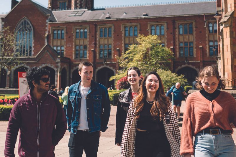 Group of students walking through the Quad