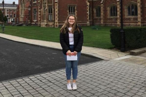 Student at open day in front of Lanyon