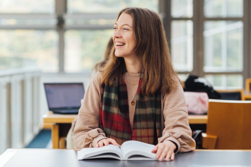 Lana in the library, PhD student