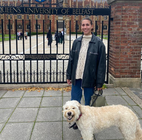 Marieke and her dog Mara in front of the Lanyon gates