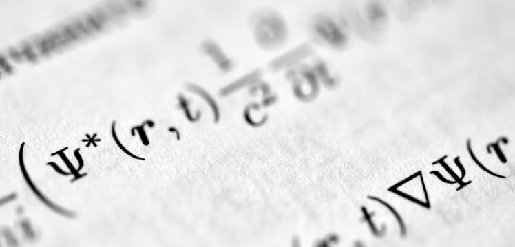 Maths equations on white paper