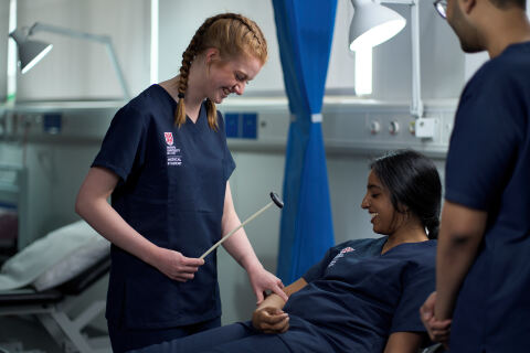 Two medicine students training in hospital setting