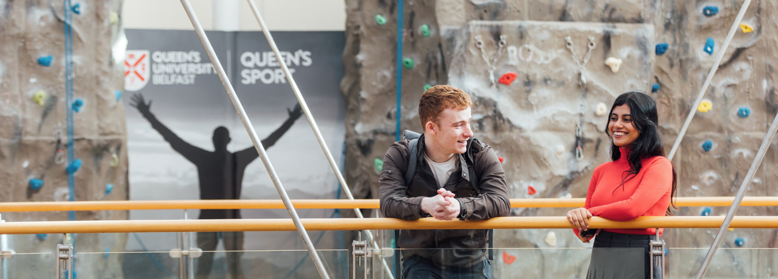Two students stand on the PEC bridge