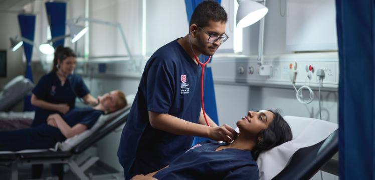 Queens medicine students in hospital setting