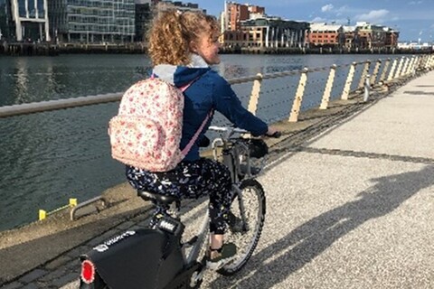 Student cycling in Titanic Quarter