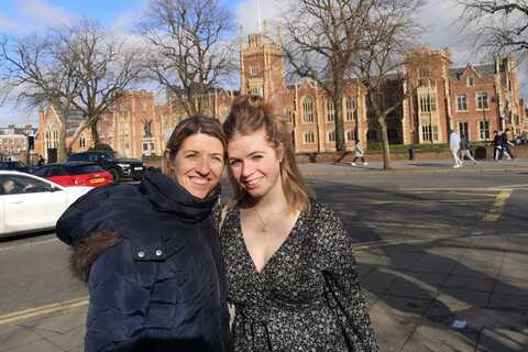 Female student and mother standing in front of Lanyon Building