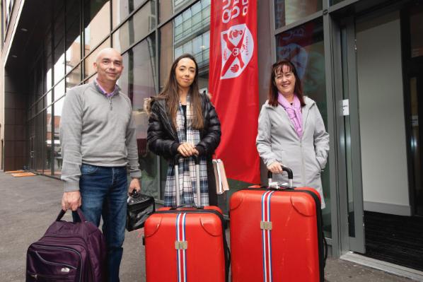 Student with parents outside Elms Accommodation