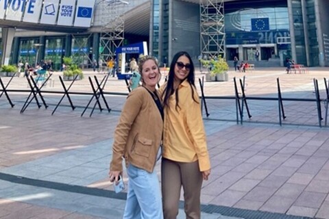 Two students outside EU Parliament