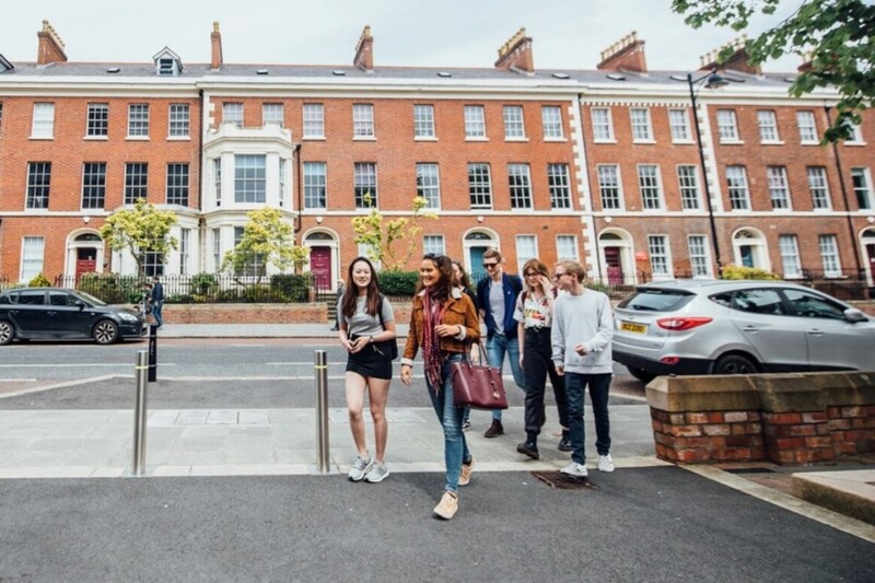 Students walking towards main campus