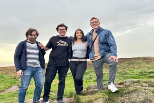 Four students hiking