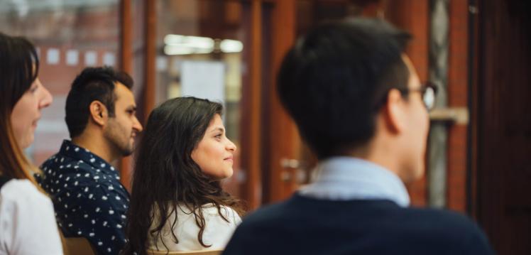 Students in tutorial in the Graduate School