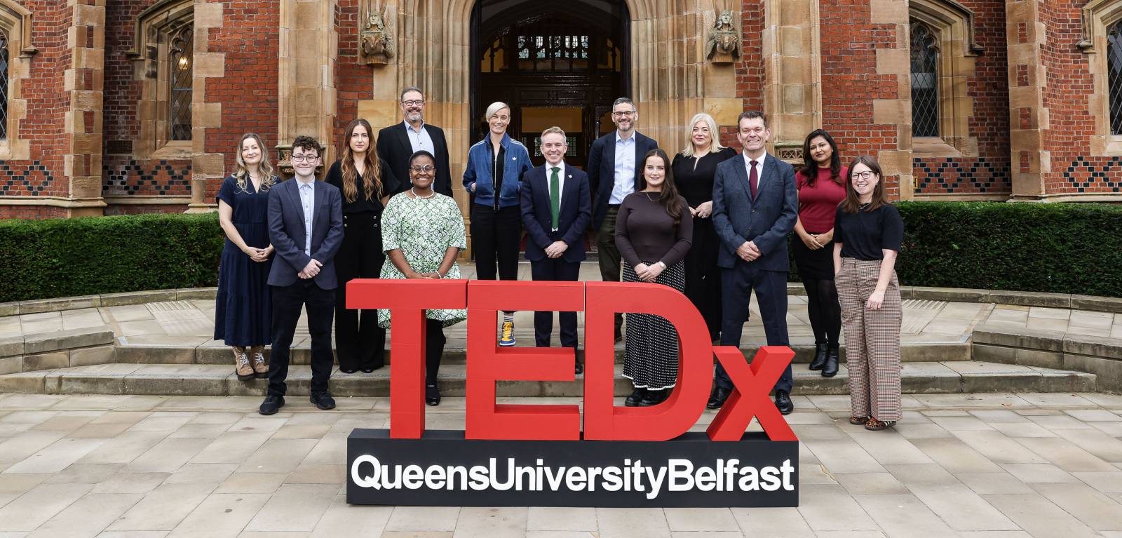 TEDxQUB speakers with Dr Ryan Feeney outside Queen's Lanyon Building