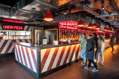 Students ordering at Queen's SU bar