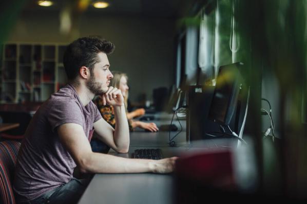 Student sitting at a computer