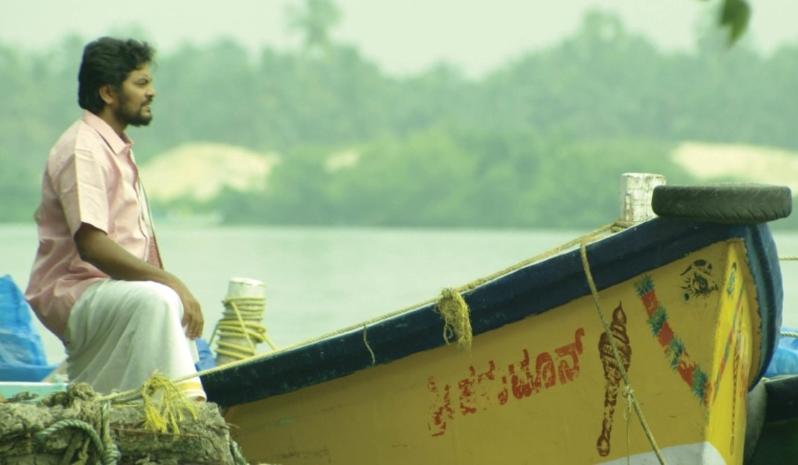 Man in boat on river