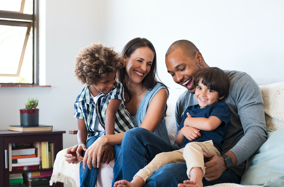 family sitting on a couch