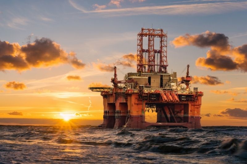 oil rig at sunset