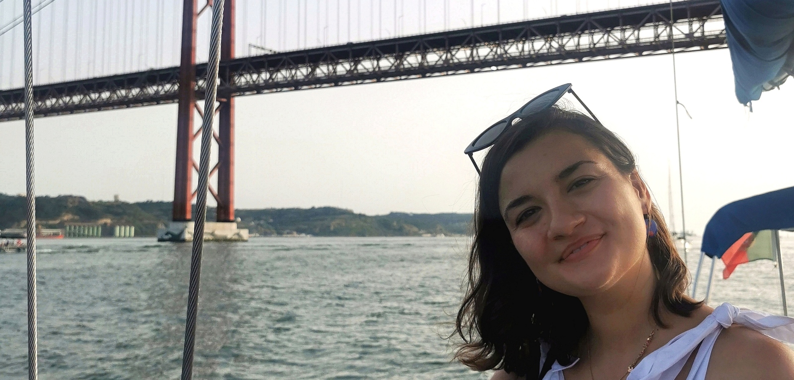 Gril on boat under the Golden Gate Bridge San Francisco