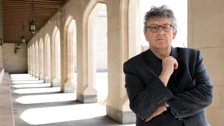 Man standing in a cloisters