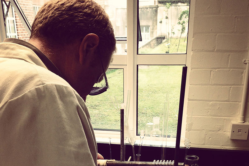 Staff member George Burton working in a laboratory