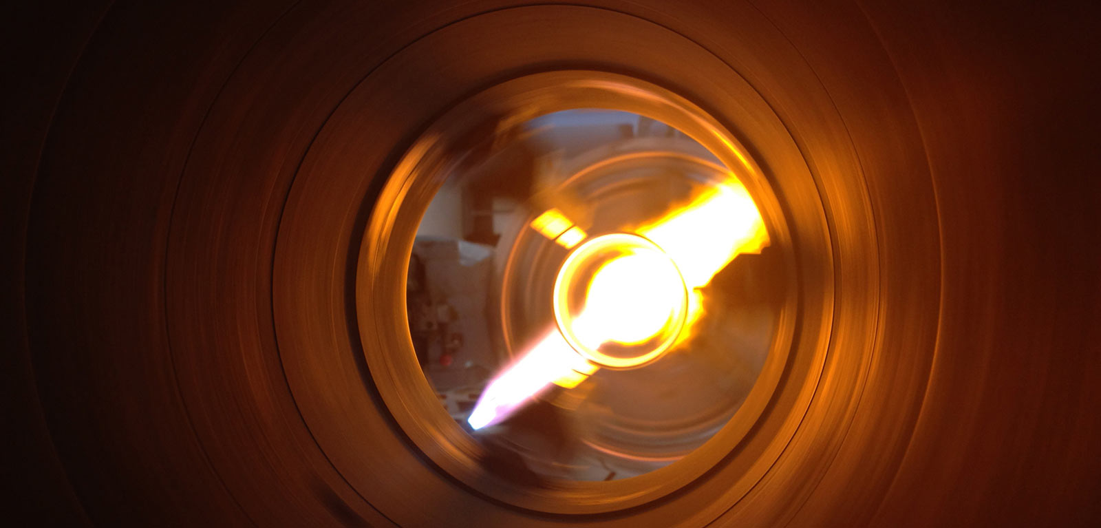 Abstract images of a Glass blowing machine in action