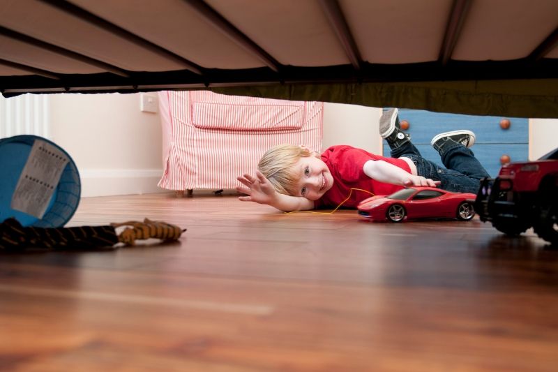 Boy playing on the floor