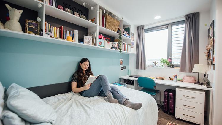 Student in bedroom