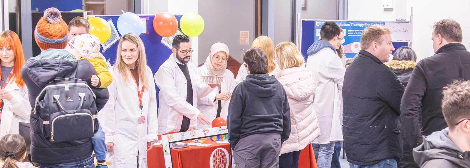Members of the public engaging with School of Pharmacy staff