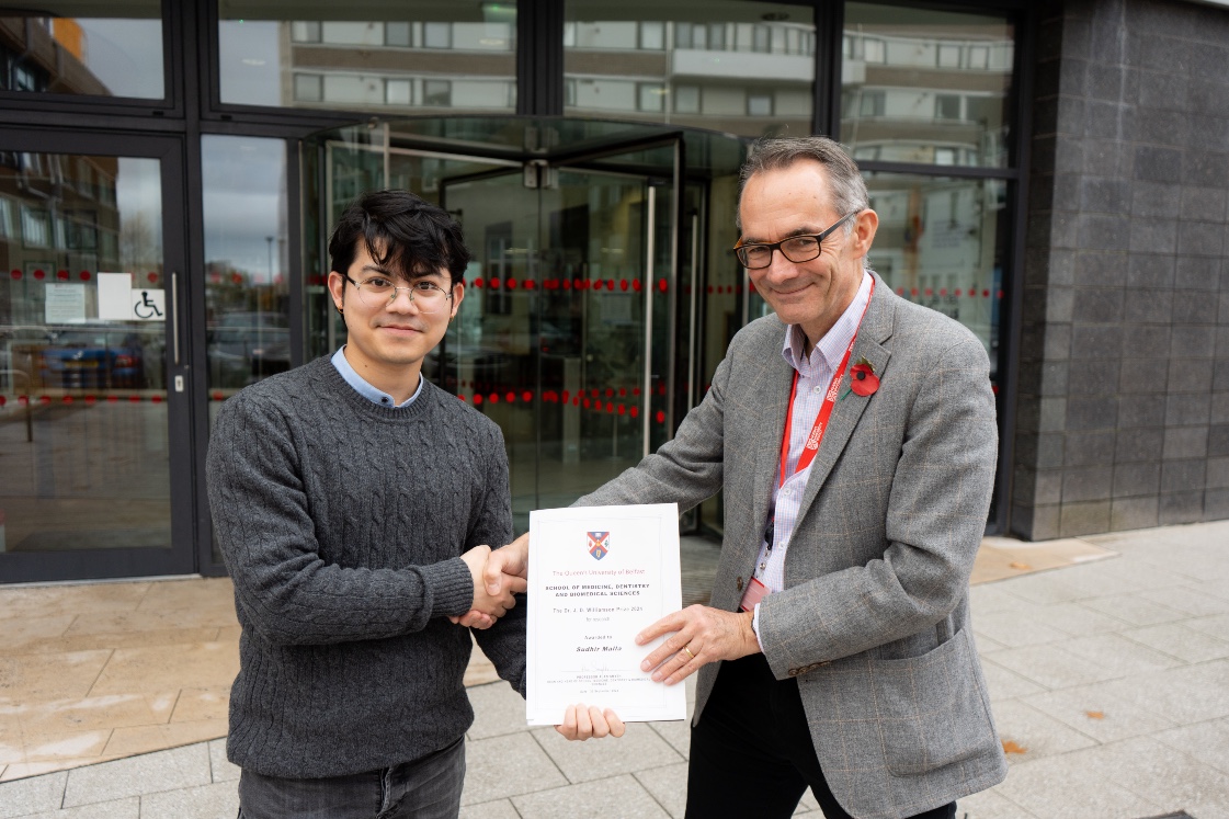 Dean and Head of School, Professor Alan Smyth, presents the 2024 JD Williamson Prize to Sudhir Malla.