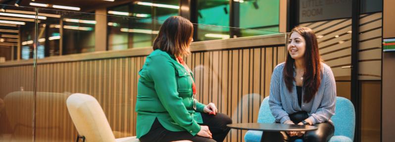 Student in support meeting with staff member