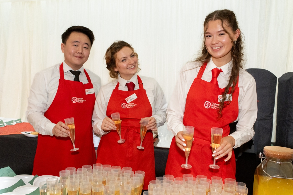 catering staff smiling and getting ready to serve at Winter graduation 2023