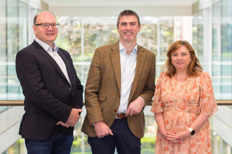 AFBI's Prof Steven Morrison (centre) with Prof Nigel Scollan (left) and Prof Sharon Huws (right) from IGFS in Queen's