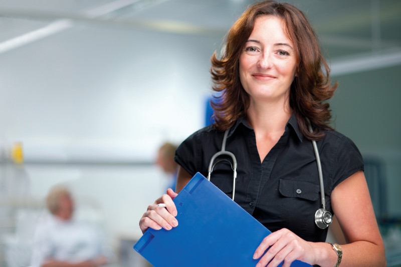 Doctor holding clipboard